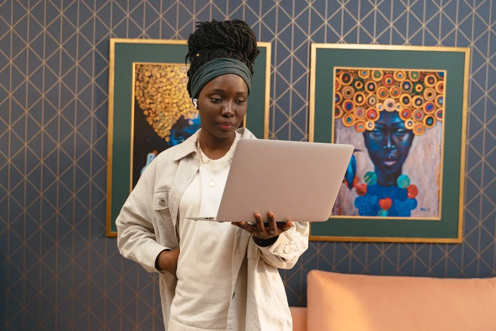 Woman in White Button Up Shirt Holding Silver Laptop